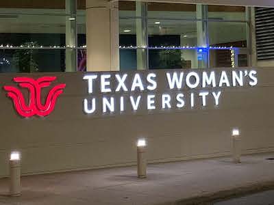 Texas Woman’s University outdoor LED sign provided by National Signs in Houston, TX