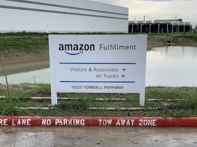 Custom post and panel signs at Amazon Fulfillment center