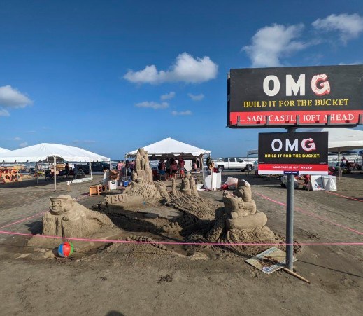 We don't just create amazing signs. We also put our artistry to work at the beach creating amazing sand scenes, like at the AIA Sandcastle Competition in Galveston!