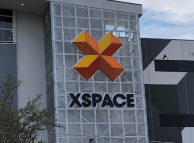 Signage on building by National Signs for XSPACE