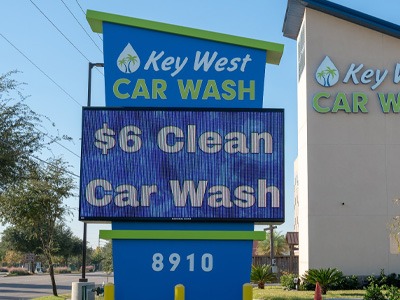Digital sign designed, fabricated, and installed by National Signs for Key West Car Wash