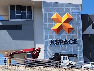 National Signs installation team during the XSPACE signage installation.