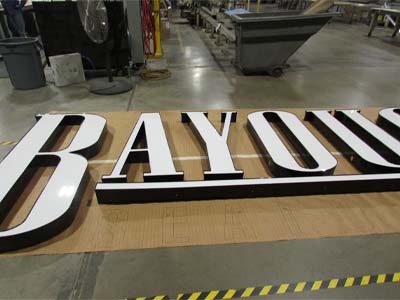 Bayou City Seafood channel letter signage during its creation.