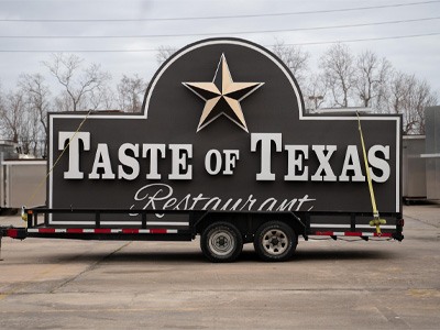 Branded business sign for Taste of Texas Restaurant designed, fabricated and installed by National Signs.