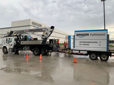 National Signs performs sign installation services for an Amazon fulfillment center.